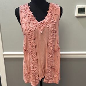 Chic Coral Sleeveless Blouse with Floral Details